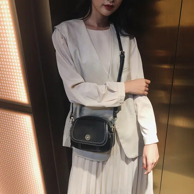 纳兰杜 女士包包复古品牌小众斜挎包高级感休闲百搭质感实用耐看小圆包单肩包 牛皮 小号 女款 黑色