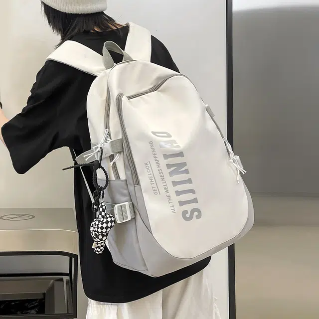 纳兰杜 大容量潮流运动轻便通勤百搭高中生高颜值学生 织物 电脑包旅行包双肩包背包书包 男女同款情侣款 灰色/子夜黑/橘配