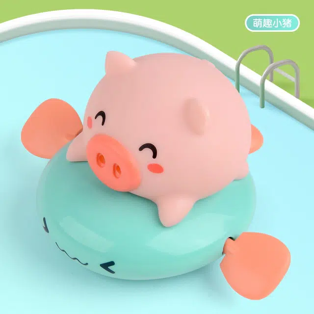 简普森 小猪骑飞鱼 上链洗澡 游泳萌趣拉线动物戏水 玩具