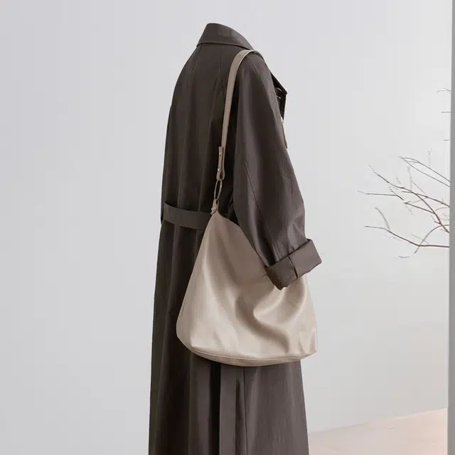 她池 通勤复古风翻领单排扣气质纯色中长款长袖风衣 女款