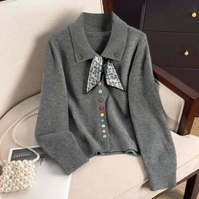 她池 设计感彩色单排扣宽松款翻领长袖针织衫 女款