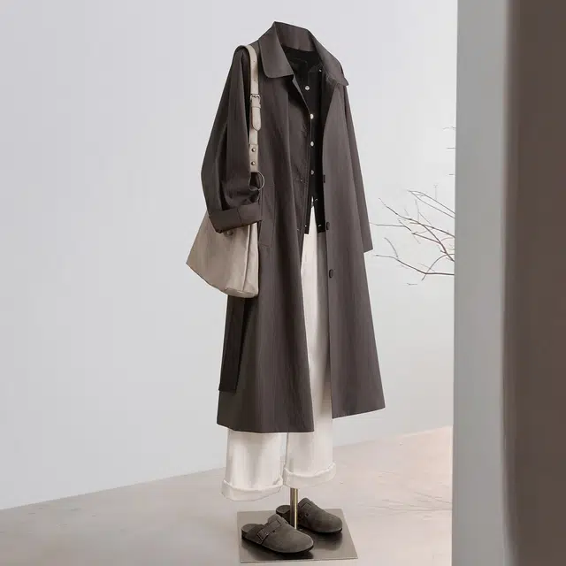 她池 通勤复古风翻领单排扣气质纯色中长款长袖风衣 女款