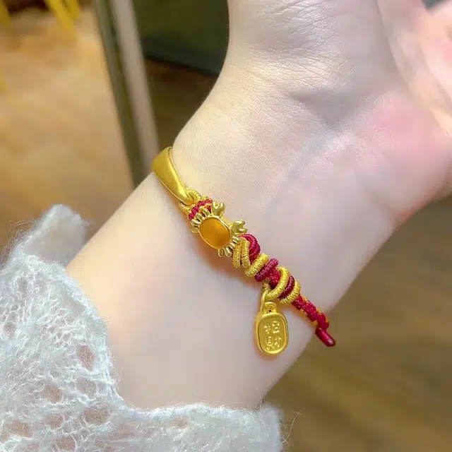 瑞诺 螃蟹编织红绳设计 足金 按克计价 黄金手链 女款