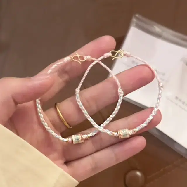 瑞诺 珐琅彩绘五彩绳时尚优选 足金 按克计价 黄金手链 女款
