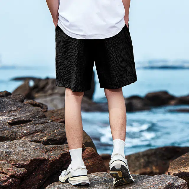 纳趣 运动宽松时尚泡泡格透气速干五分休闲短裤 男女同款