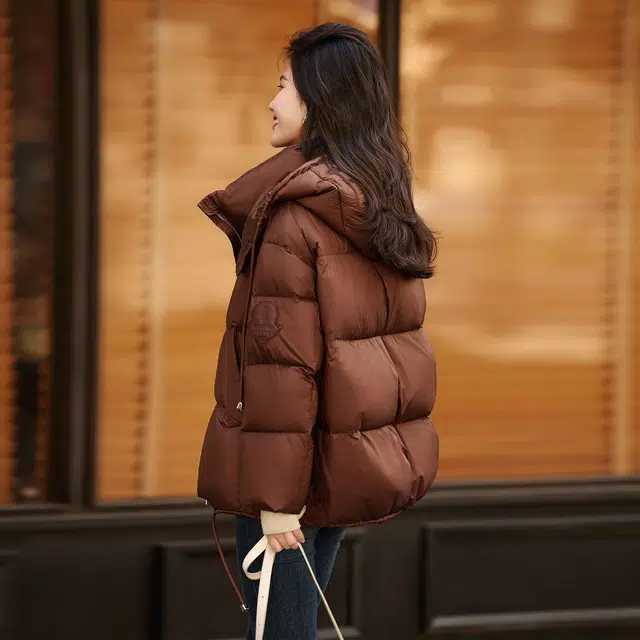 苏醒的乐园 保暖通勤纯色宽松连帽加厚羽绒服 女款 咖色