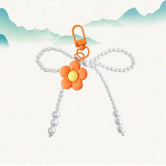 卡莱茵 小众 可爱橙色花朵 精致手机链 书包 挂饰 车吊饰 亚克力 挂件 男女同款情侣款