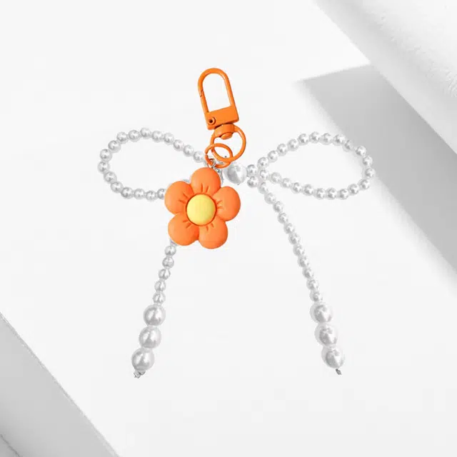卡莱茵 小众 可爱橙色花朵 精致手机链 书包 挂饰 车吊饰 亚克力 挂件 男女同款情侣款