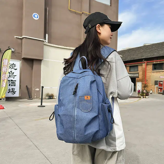 泰迪珍藏 复古轻便旅行通勤 牛仔拼网 双肩包 男女同款情侣款 蓝色/黑色