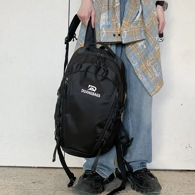 泰迪珍藏 轻便背包大容量旅行初中生高中大学生登山书包 牛津布 双肩包 男女同款情侣款 米白色/深灰色/黑色
