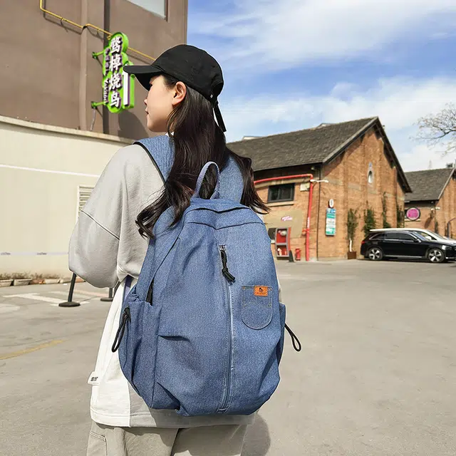 泰迪珍藏 复古轻便旅行通勤 牛仔拼网 双肩包 男女同款情侣款 蓝色/黑色