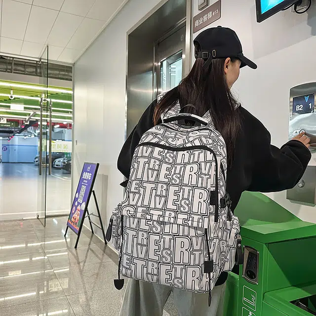 泰迪珍藏 通勤休闲字母 尼龙 双肩包 常规 男女同款情侣款 多色