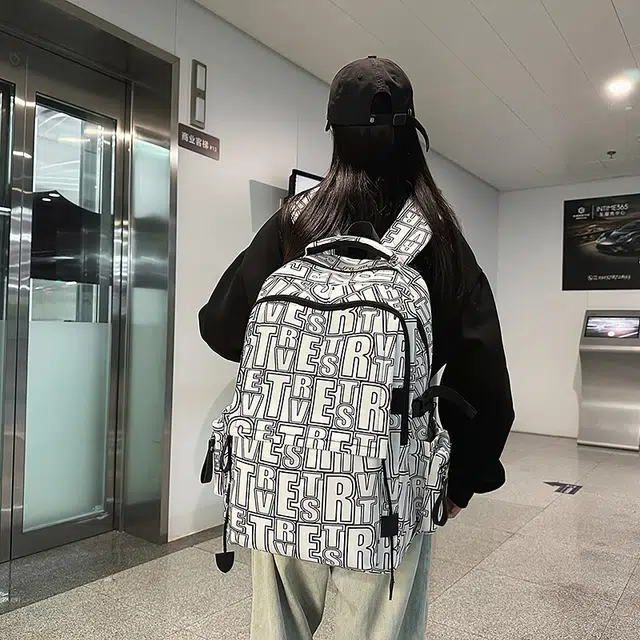 泰迪珍藏 通勤休闲字母 尼龙 双肩包 常规 男女同款情侣款 多色