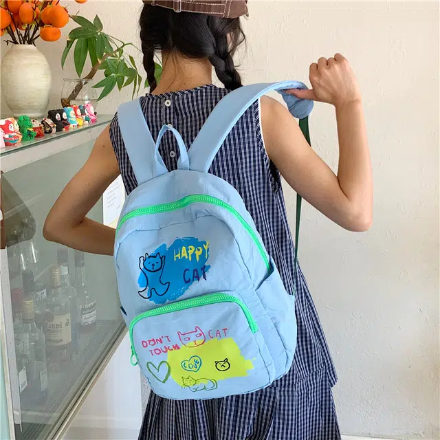泰迪珍藏 韩版小众个性涂鸦蛋糕学生上课书包大容量通勤 帆布 双肩包 女款 多色