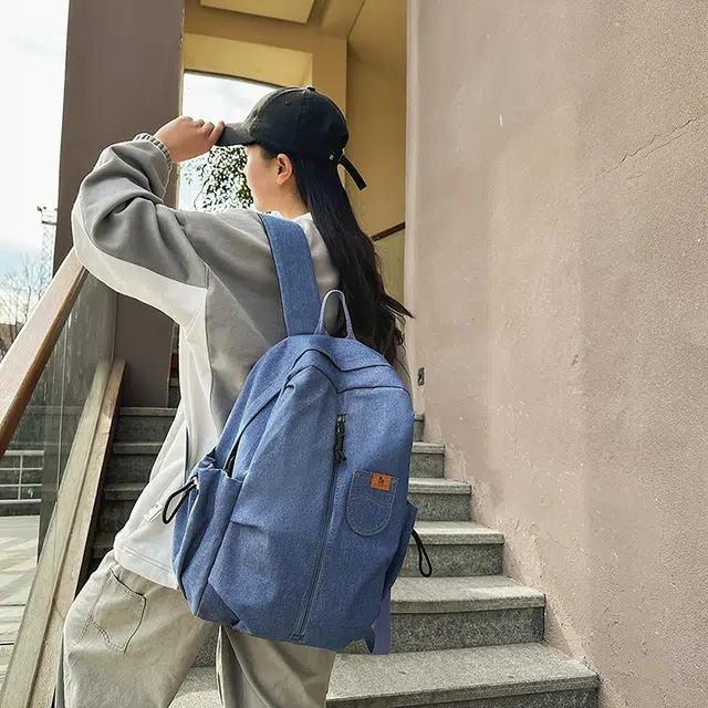 泰迪珍藏 复古轻便旅行通勤 牛仔拼网 双肩包 男女同款情侣款 蓝色/黑色