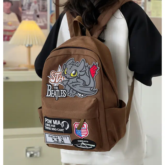 泰迪珍藏 潮流嘻哈小众美式复古风小怪兽 帆布 双肩包 男女同款情侣款 咖啡色