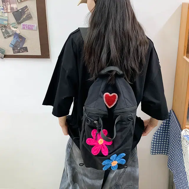 泰迪珍藏 轻便简约百搭花朵学生 尼龙 书包背包双肩包 女款 黑色