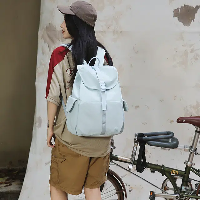 泰迪珍藏 多口袋轻便双背包大学生休闲旅游背包简约款背包抽绳翻盖韩版书包 尼龙 双肩包 女款 多色