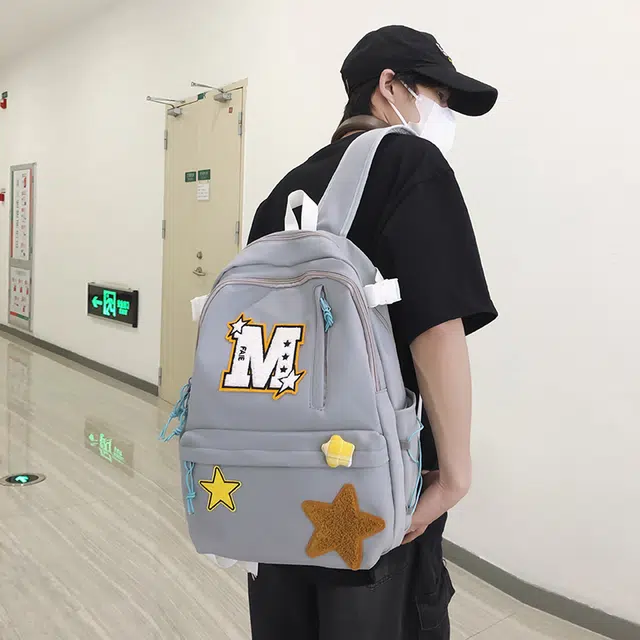 泰迪珍藏 韩版复古百搭学生星星包 尼龙 双肩包 男女同款情侣款 多色