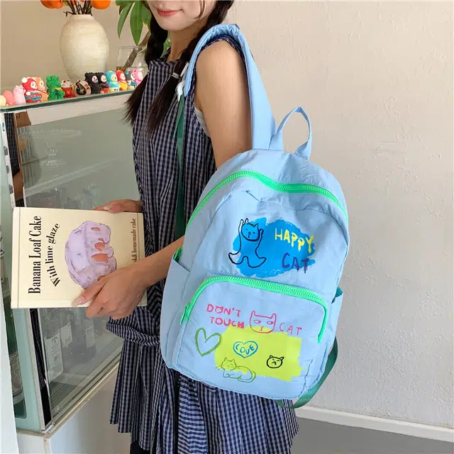 泰迪珍藏 韩版小众个性涂鸦蛋糕学生上课书包大容量通勤 帆布 双肩包 女款 多色