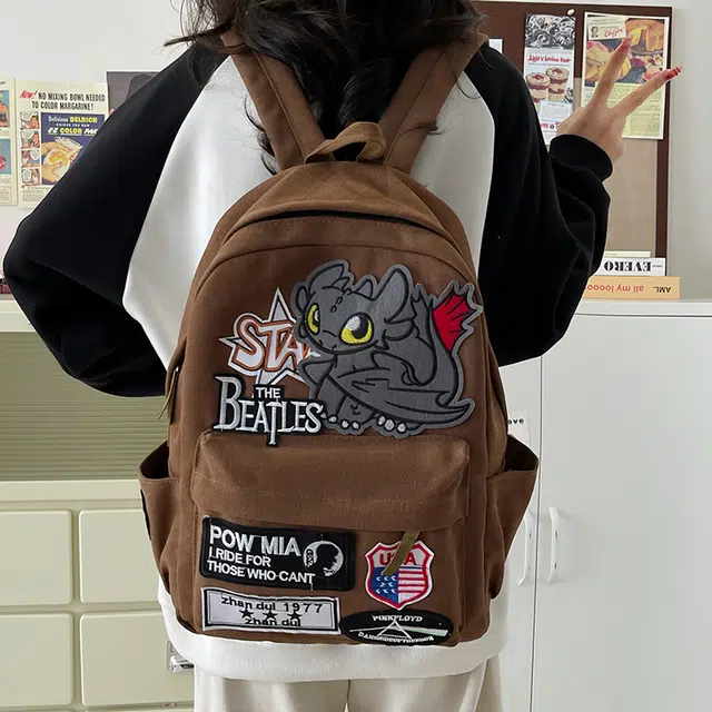 泰迪珍藏 潮流嘻哈小众美式复古风小怪兽 帆布 双肩包 男女同款情侣款 咖啡色