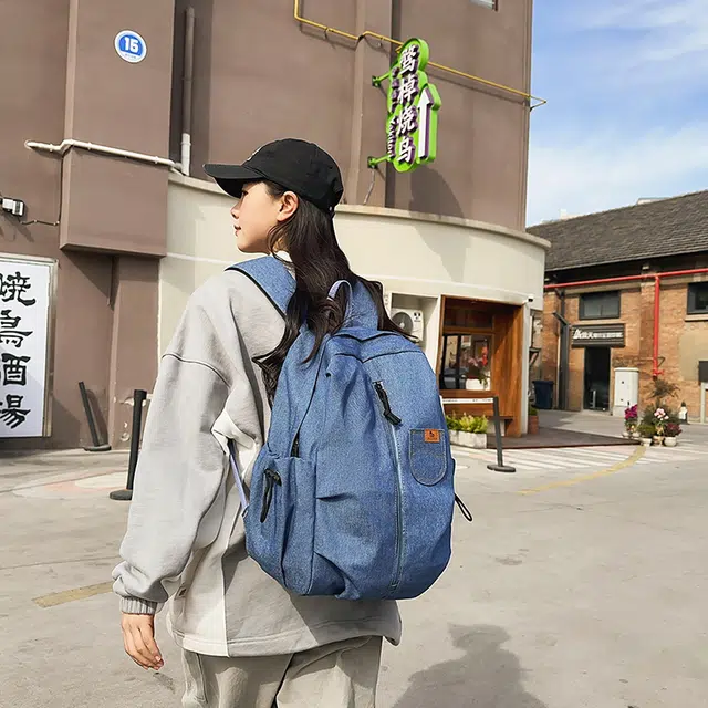 泰迪珍藏 复古轻便旅行通勤 牛仔拼网 双肩包 男女同款情侣款 蓝色/黑色