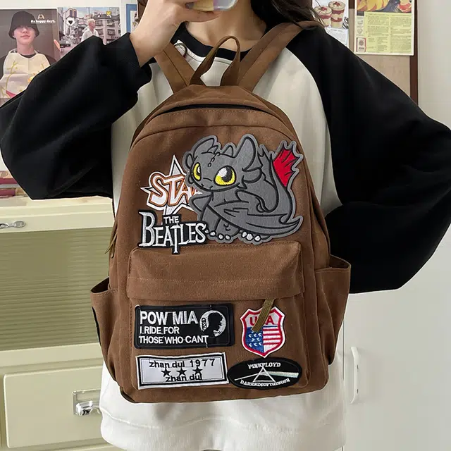 泰迪珍藏 潮流嘻哈小众美式复古风小怪兽 帆布 双肩包 男女同款情侣款 咖啡色