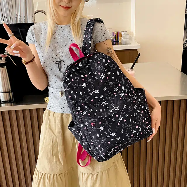 泰迪珍藏 学院风可爱小清新卡通初中高中生旅游轻便 尼龙布 双肩包 女款 黑色骷髅头