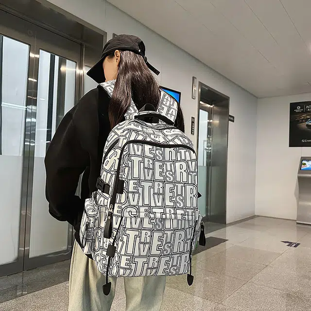泰迪珍藏 通勤休闲字母 尼龙 双肩包 常规 男女同款情侣款 多色
