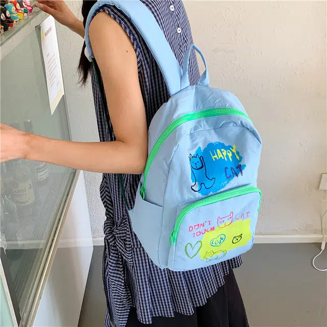 泰迪珍藏 韩版小众个性涂鸦蛋糕学生上课书包大容量通勤 帆布 双肩包 女款 多色