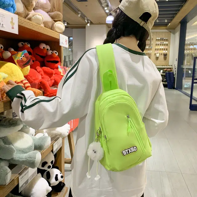 爱尔绅特 韩版简约小众设计骑行上课旅游 尼龙 斜挎包单肩包胸包 常规 男女同款情侣款 黄色/白色/黑色/绿色/粉色