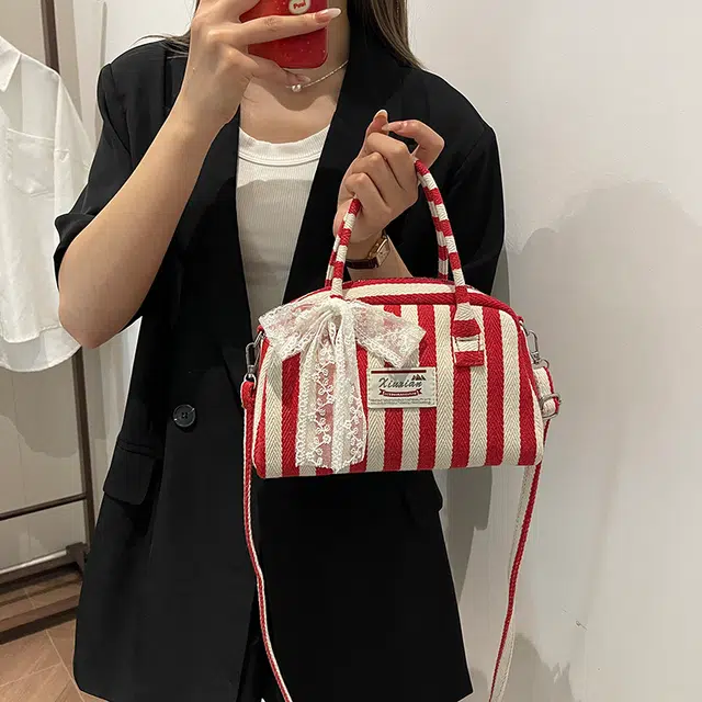 爱尔绅特 休闲拉链开合 帆布 帆布包单肩斜挎包 常规 女款 黑色/红色