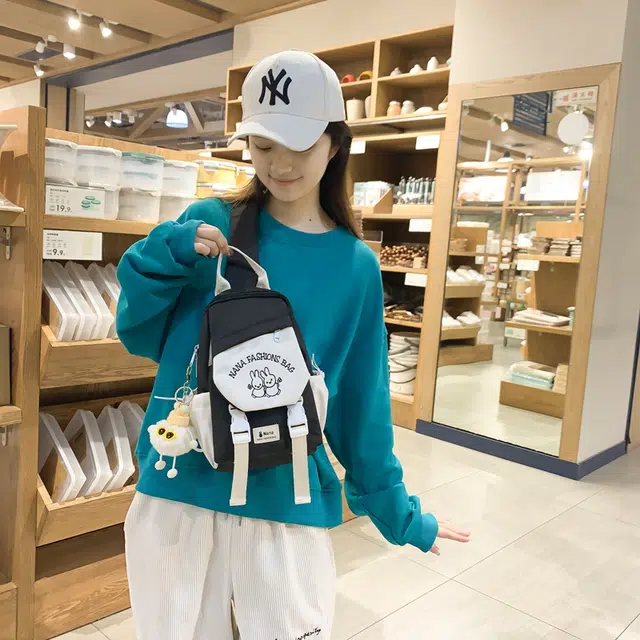 爱尔绅特 清新休闲运动斜背骑行 尼龙 胸包 男女同款情侣款 黑色/绿色/白色/粉红色/紫色