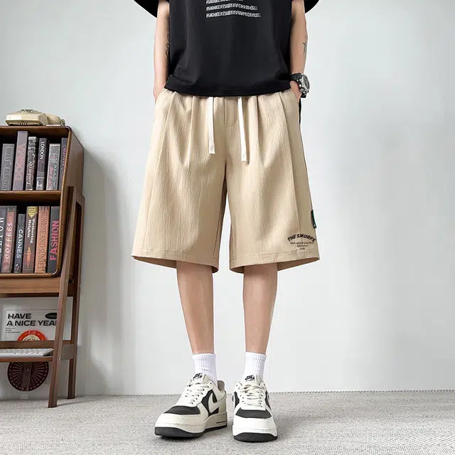 蓝精灵 美式复古蚂蚁皱设计感潮流水洗个性高级感简约通勤学院时尚舒适宽松百搭休闲短裤 男女同款
