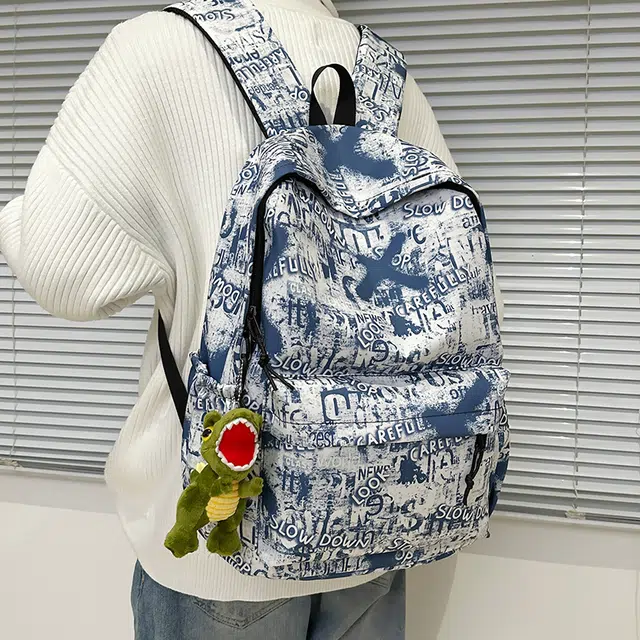 辛巴赫 韩版气质潮流学院风书包日常休闲百搭出差旅行背包 尼龙 双肩包 常规 男女同款情侣款 紫色