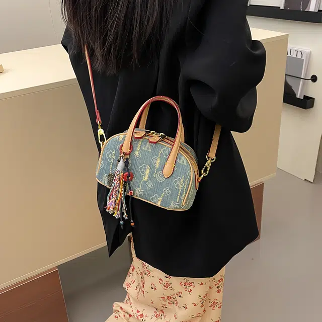 辛巴赫 复古潮流时尚气质百搭设计感 牛仔布 单肩斜挎手提包 女款 蓝色