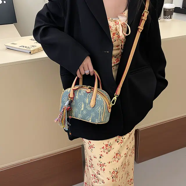 辛巴赫 复古潮流时尚气质百搭设计感 牛仔布 单肩斜挎手提包 女款 蓝色