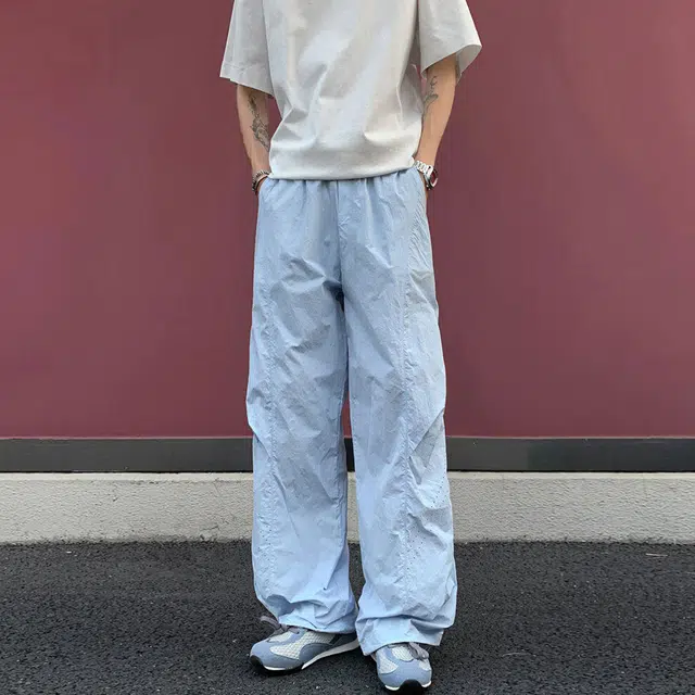西行纪 美式高街时尚小众多巴胺色系激光打孔速干冰丝直筒长裤日常宽松百搭舒适垂顺轻薄透气松紧中腰休闲裤 男女同款
