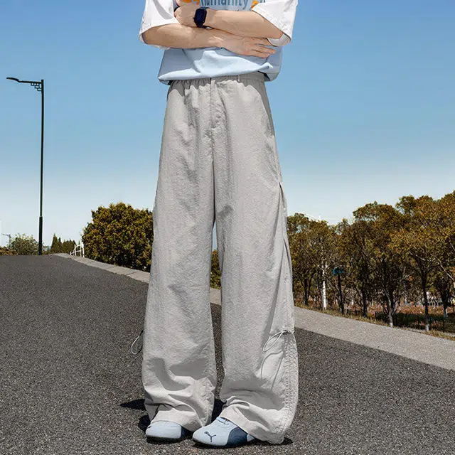 西行纪 美式高街机能伞兵裤宽松裤腿抽绳设计感冰丝凉感速干长裤薄款透气运动休闲裤 男女同款