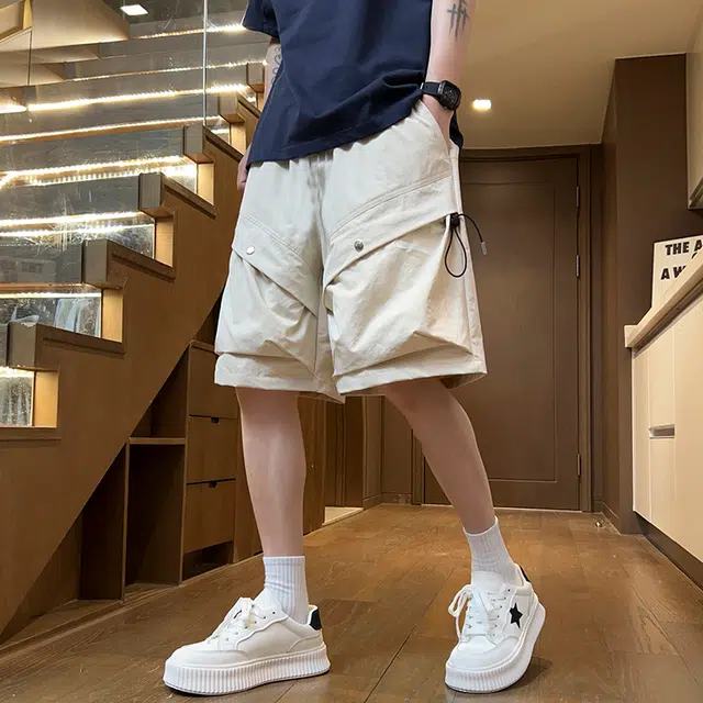 西行纪 高街设计感结构款潮牌宽松松紧褶皱百搭五分裤日常通勤大口袋休闲户外运动工装短裤 男女同款