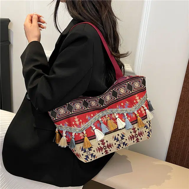 度森袋鼠 高颜值时尚百搭民族风流苏出行旅游 帆布 帆布包单肩包 女款 红色/棕色/蓝色