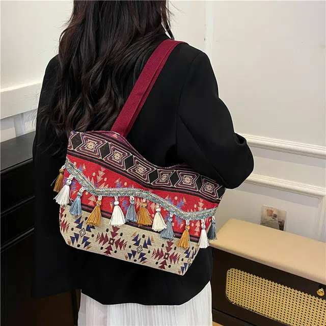 度森袋鼠 高颜值时尚百搭民族风流苏出行旅游 帆布 帆布包单肩包 女款 红色/棕色/蓝色