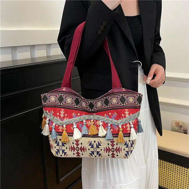 度森袋鼠 高颜值时尚百搭民族风流苏出行旅游 帆布 帆布包单肩包 女款 红色/棕色/蓝色