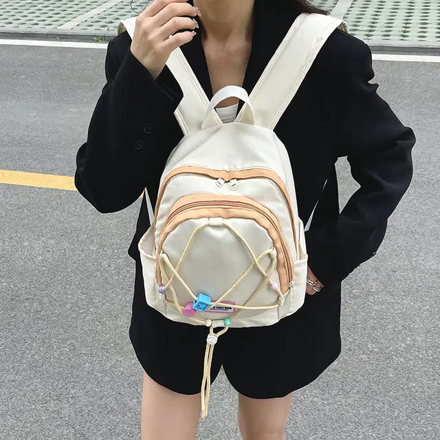 如意士 时尚潮流百搭 尼龙 双肩包 常规 女款 米白色/紫色