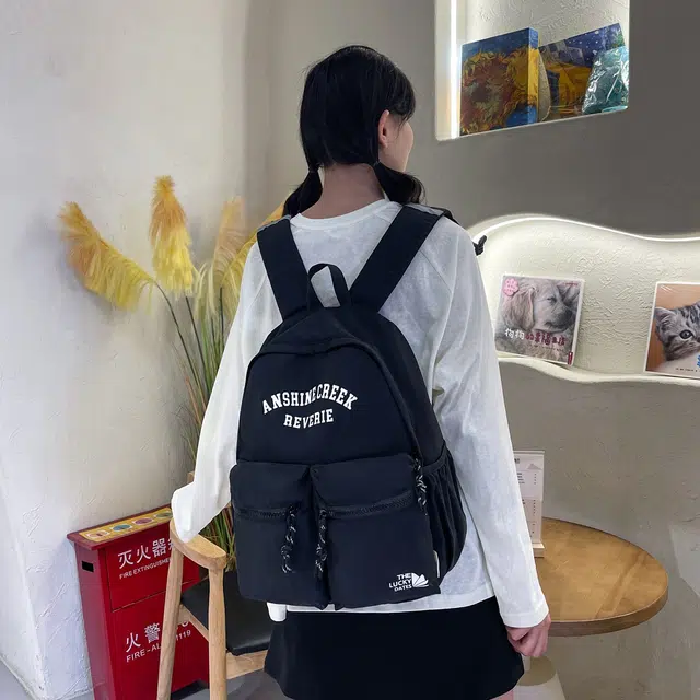 如意士 休闲日常 百搭时尚字母简约 尼龙 双肩包 常规 男女同款情侣款 多色