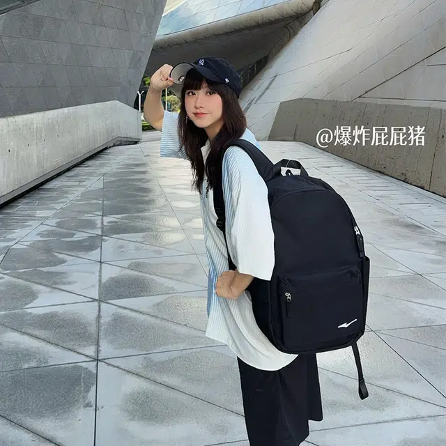 鸿星尔克 书包大学生上课通勤纯色百搭休闲简约大容量 纺织织物 双肩包 常规 男女同款情侣款 正黑