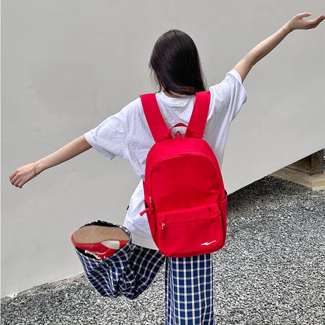 鸿星尔克 书包大学生上课通勤纯色百搭休闲简约大容量 纺织织物 双肩包 常规 男女同款情侣款 釉红