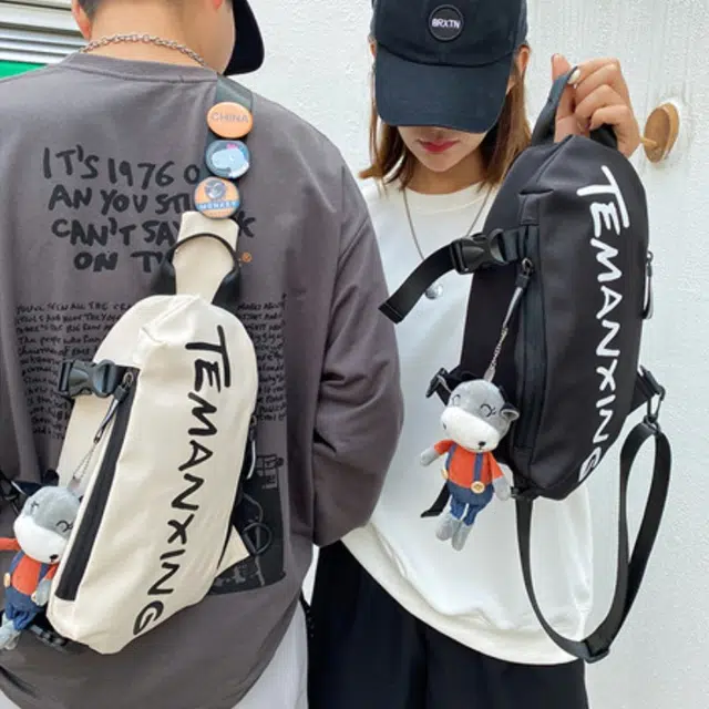 爱尔绅特 潮流大容量多功能休闲潮 牛津布 单肩包 常规 男女同款情侣款 白色/ 黑色
