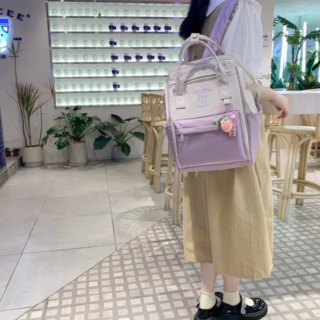 爱尔绅特 大容量百搭轻防水时尚初高中学生拼色简约 尼龙 双肩包 女款 白色/黑色