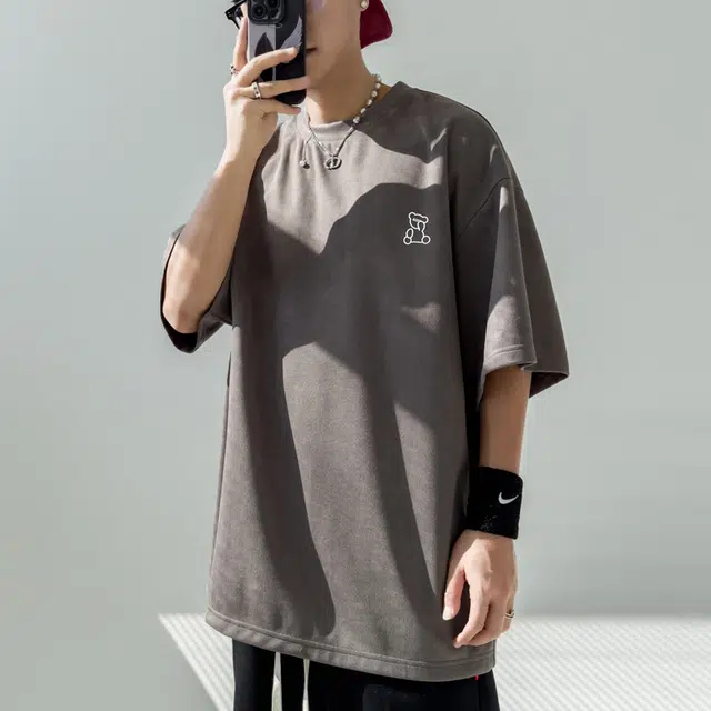 KM T
